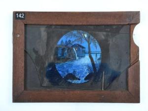 A slipping slide, moving the glass slightly produces a moire patterns from the scratched paint