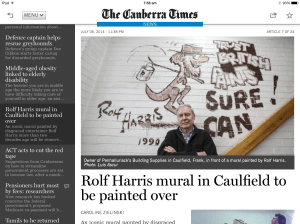 Rolf mural painted over in red paint