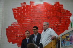 Rolf mural painted over in red paint